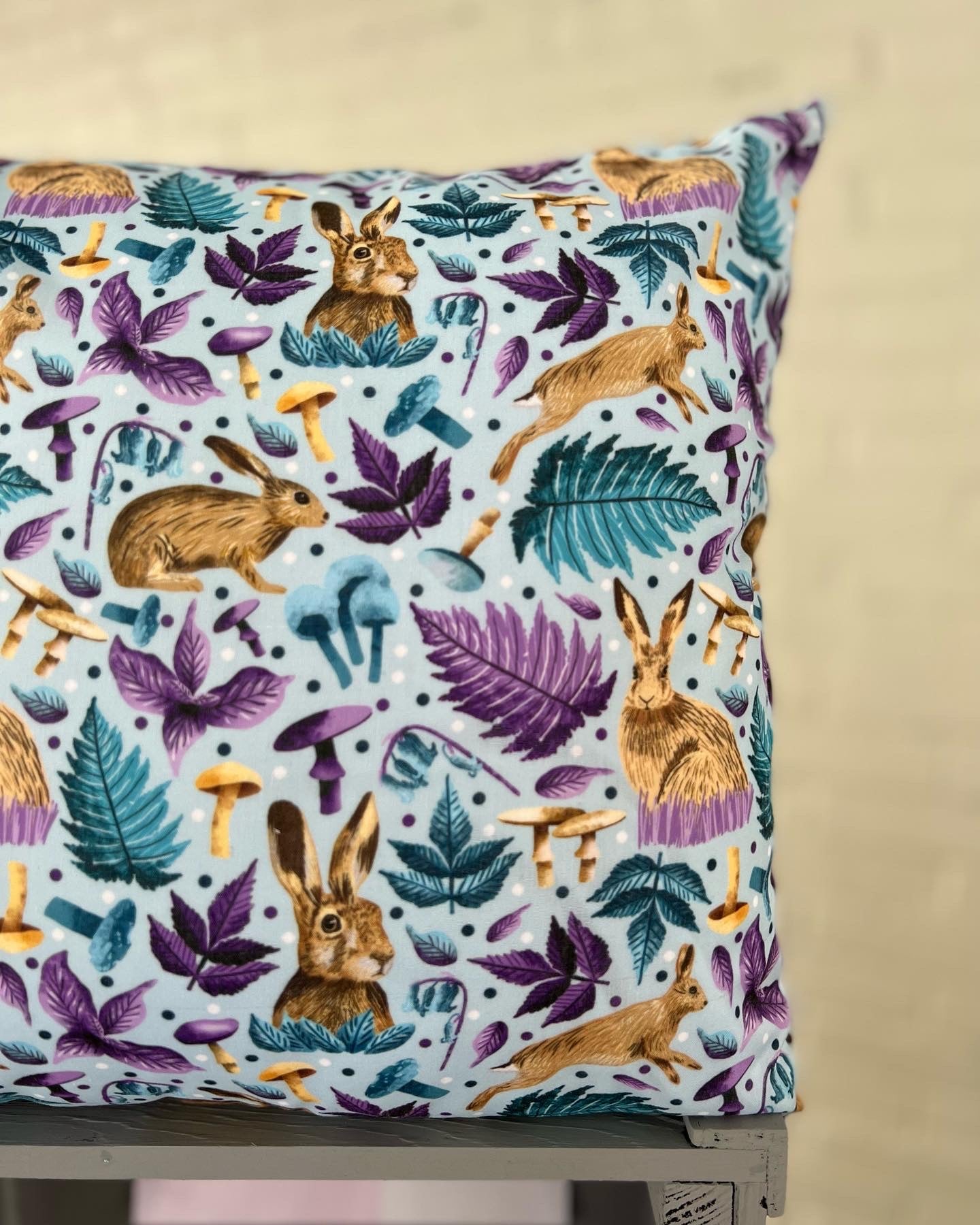 Shop rabbit gifts with our decorative pillow for a sofa with the lovely hare pattern on it. This hare cushion cover is ideal as a gift for someone who loves hares.