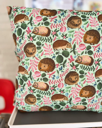 Closeup of hedgehog cushion, a great hedgehog gift for decorative use on a bed. This hedgehog gift is ideal for a hedgehog lover.