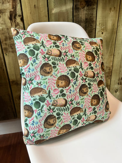 Charming hedgehog cushion, perfect for adding a touch of cottagecore decor to your home.