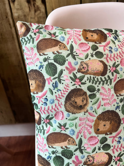 closeup corner of a hedgehog gift, the hedgehog cushion cover is ideal for a hedgehog lover to use as a decorative cushion for a bed