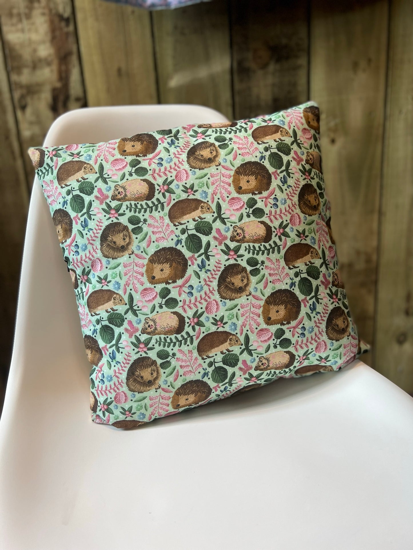 Hedgehog-themed cushion, ideal for adding a cozy vibe to your cottagecore-inspired home