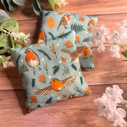 Shop reusable hand warmers that are easy to reheat and reuse again and again. These robin patterned hand warmers are ideal as a gift for cold hands.