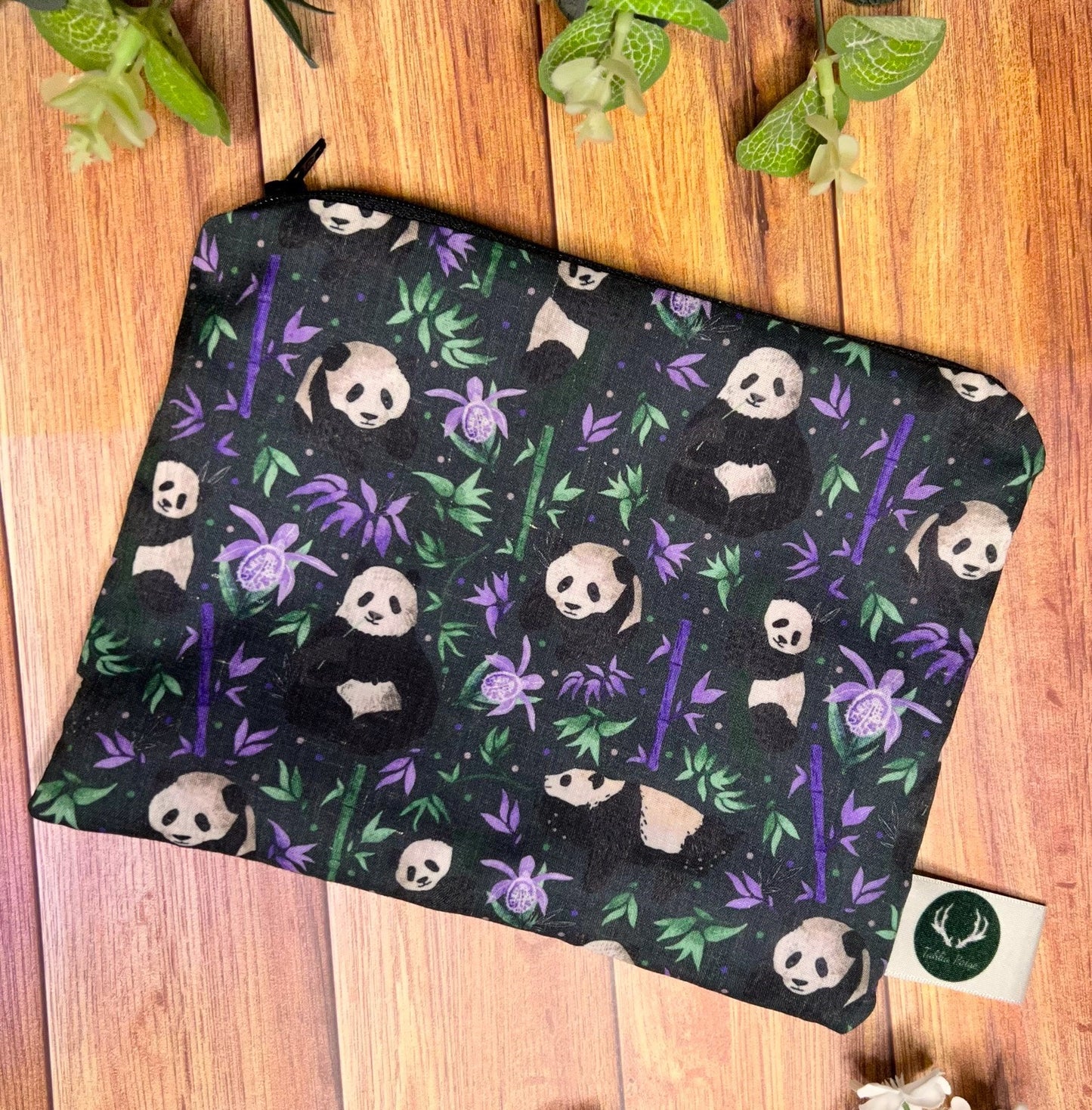 ideal as a present for a panda lover, our panda pouch is great for handbag storage and has a lovely dark surface pattern design on it.