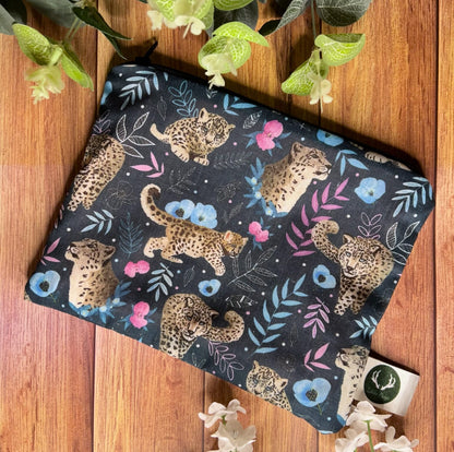 Shop our snow leopard gift ideas with this lovely dark navy pouch with a snow leopard pattern on it. This endangered species gift is a great gift for your girlfriend.
