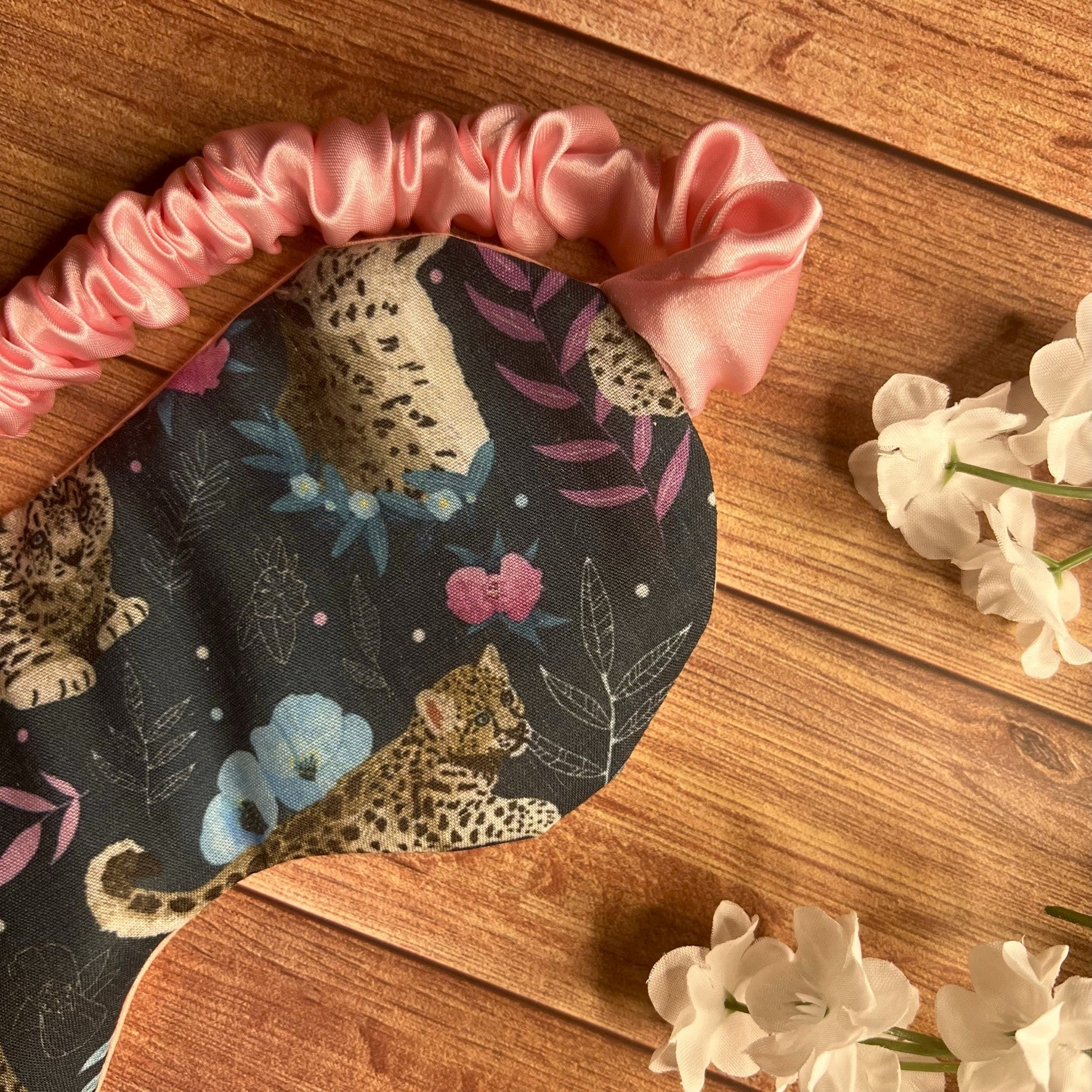 Snow leopard print sleep mask, ideal for a relaxing gift.