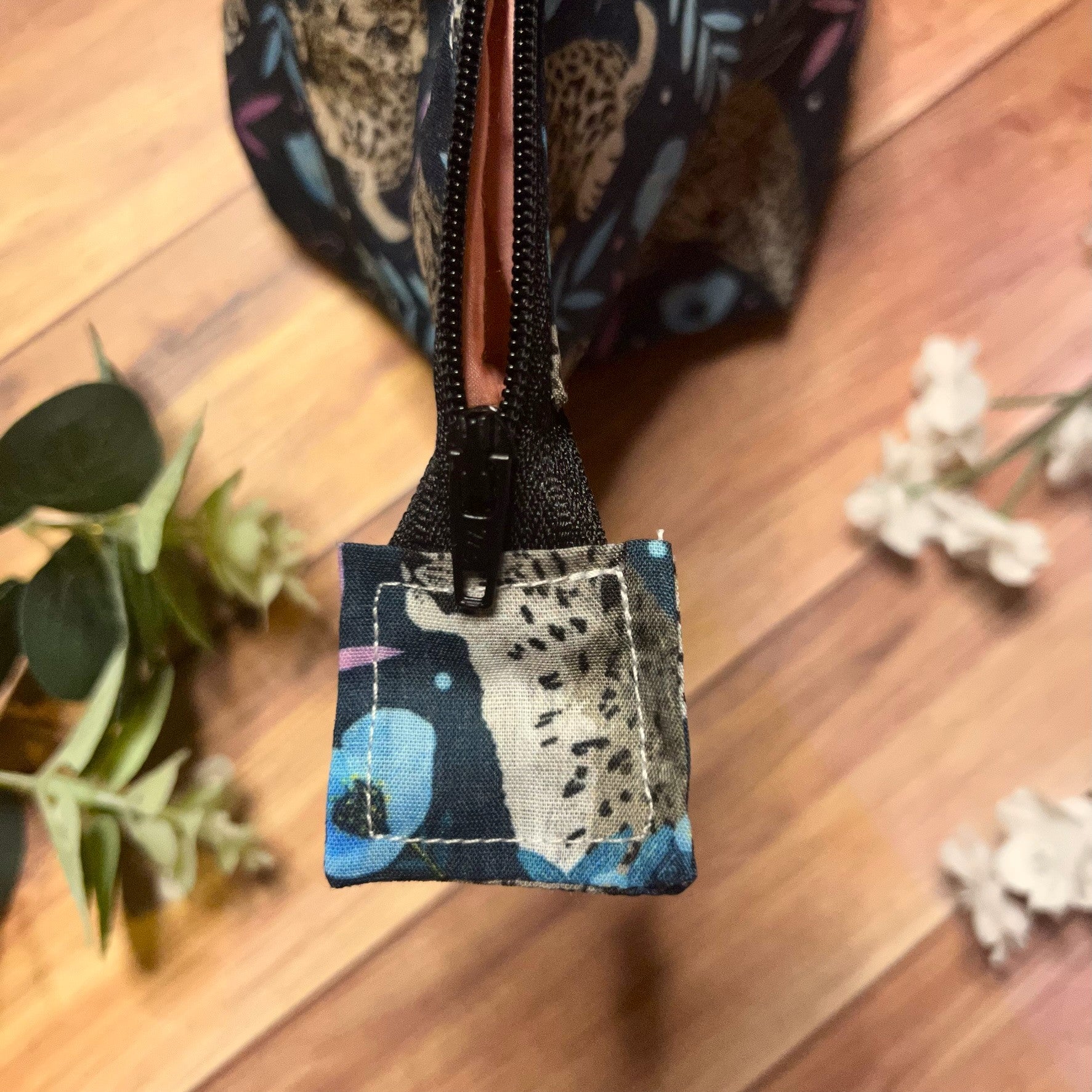 Snow Leopard Makeup Bag, ideal for makeup lovers.