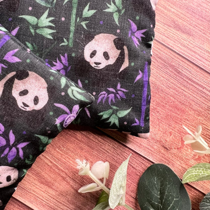 closeup of panda hand warmers, a great hand warmer gift set as a set of two hand warmers, a great gift idea for a panda lover