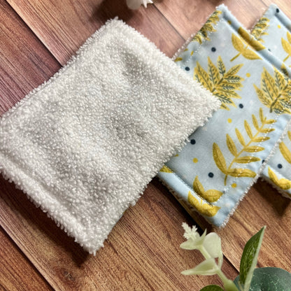 Closeup of towelling on a exfoliating pad to show the texture, these skincare gifts are perfect for nature lovers with their nature pattern on the front, and help with important self care and skincare.