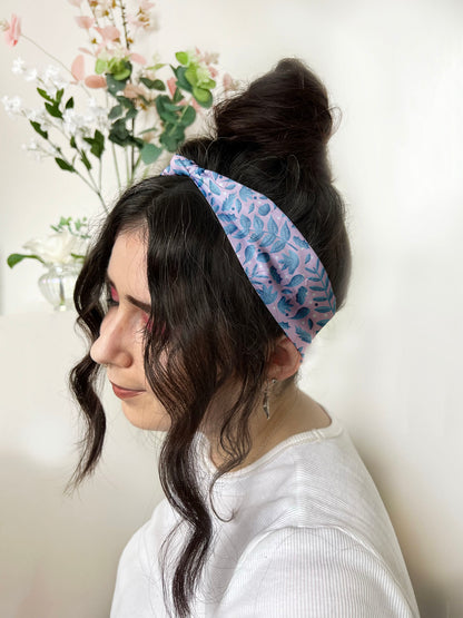 Headband being modelled by dark haired girl,  enjoy blue hair accessories  on short hair with this leafy headband