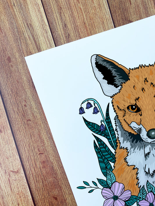 An image of a fox a4 art print for wall decor, an ideal gift for an animal lover. It shows the modern illustration style of a fox and flowers around it.