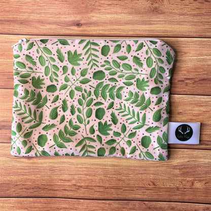 ideal as a gift for someone going travelling, this storage pouch has a green nature pattern and is a cute cosmetic bag for storage. 