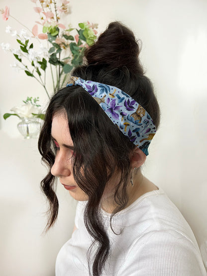 dark haired girl wears hare patterned headband, ideal as a rabbit gift and a part of the  handmade hair accessories  collection