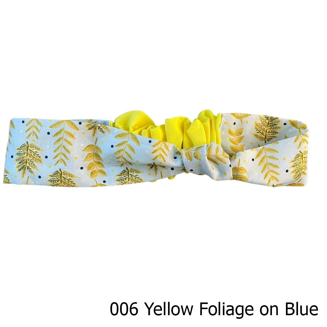 yellow foliage patterned headband on white background