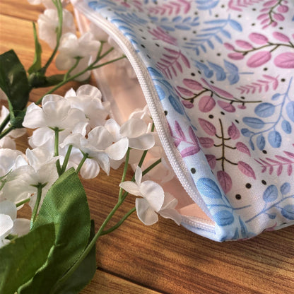 ideal for makeup storage, this storage pouch is a great gift for a makeup lover with a soft light blue pattern and lining
