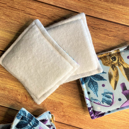 hare patterned reusable skincare pads shown with two flipped over to show the white brushed cotton sides