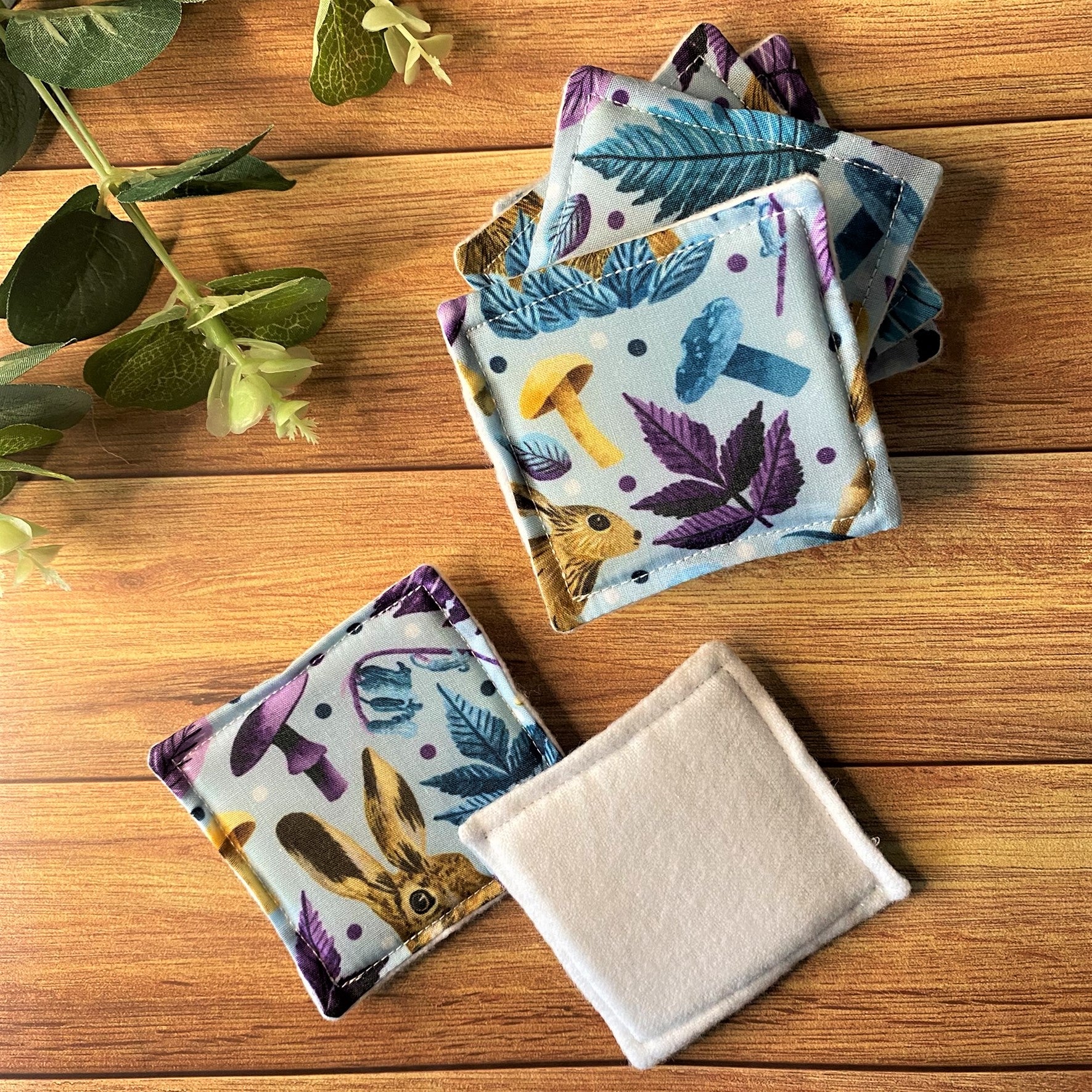 hare patterned reusable skincare pads on a wooden background